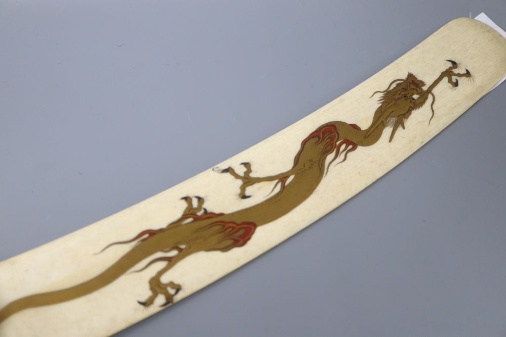 A carved ivory letter opener, with hand painted enamel gilt dragon, length 34cm